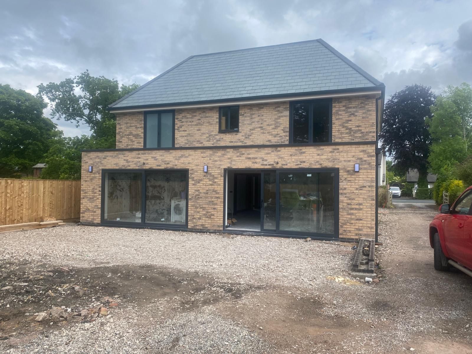 4-bed brick new build with full-height bifold doors